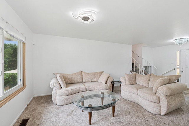 3551 Marseilles Ln, Hazel Crest, IL 60429 - carpeted living room featuring stairway and healthy amount of natural light