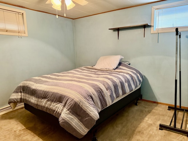 2503 Main St, Peru, IL 61354 - carpeted bedroom featuring crown molding and ceiling fan