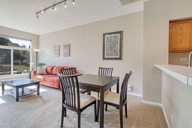 8156 Ripple Ridge Dr, Darien, IL 60561 - dining space featuring light carpet and track lighting