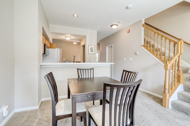 8156 Ripple Ridge Dr, Darien, IL 60561 - dining room with light colored carpet and stairway