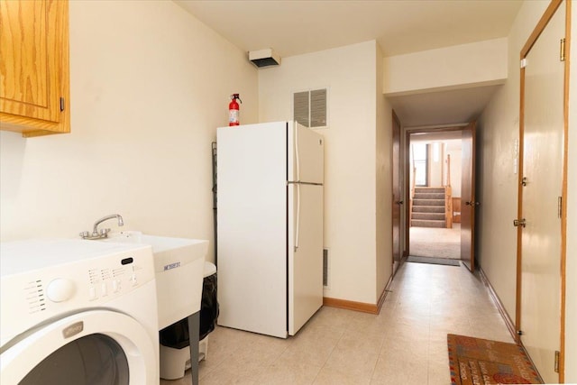18014 Idaho Ct, Orland Park, IL 60462 - laundry room featuring washer / dryer and cabinet space