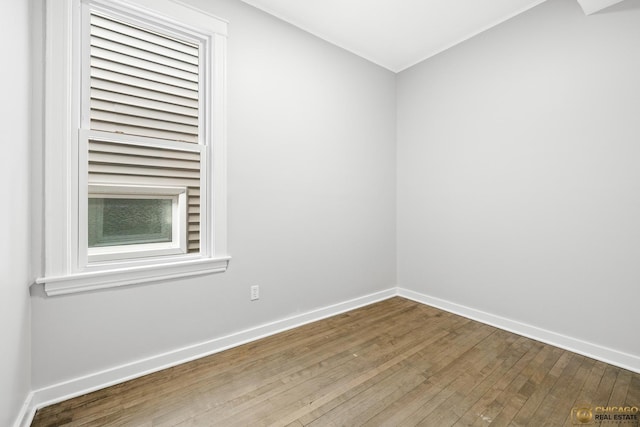 1336 Euclid Ave, Berwyn, IL 60402 - spare room featuring wood-type flooring and baseboards