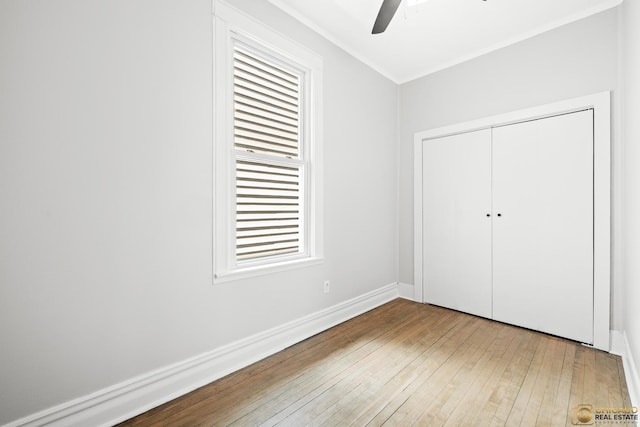 1336 Euclid Ave, Berwyn, IL 60402 - unfurnished bedroom with wood-type flooring, a closet, a ceiling fan, and ornamental molding