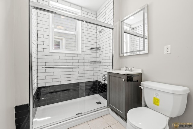 1336 Euclid Ave, Berwyn, IL 60402 - full bath featuring vanity, a shower stall, and tile patterned floors