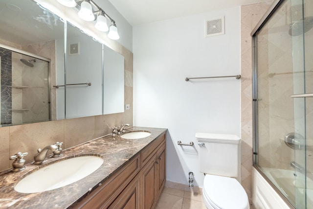 111 E Chestnut St Unit 55D, Chicago, IL 60611 - bathroom with double vanity, tile patterned flooring, and bath / shower combo with glass door