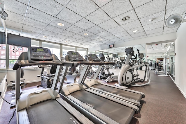 111 E Chestnut St Unit 55D, Chicago, IL 60611 - gym featuring plenty of natural light and a paneled ceiling