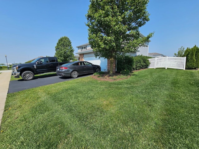 1506 Saddle Run Ln, Beecher, IL 60401 - view of yard featuring a garage