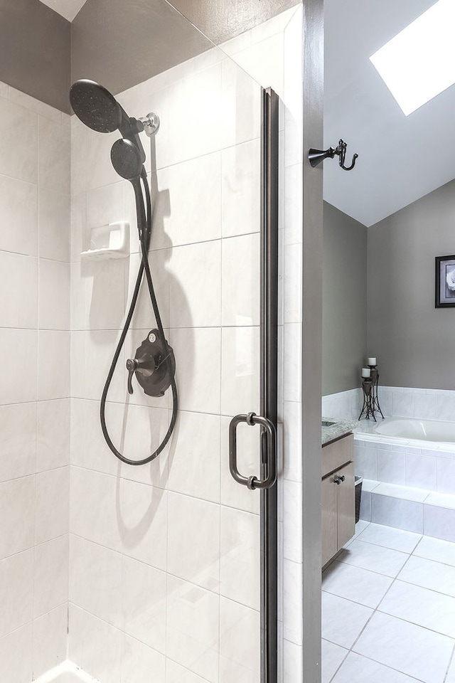 8124 Glenbrook Pl, Tinley Park, IL 60487 - full bathroom with a shower stall, a garden tub, tile patterned flooring, vanity, and lofted ceiling