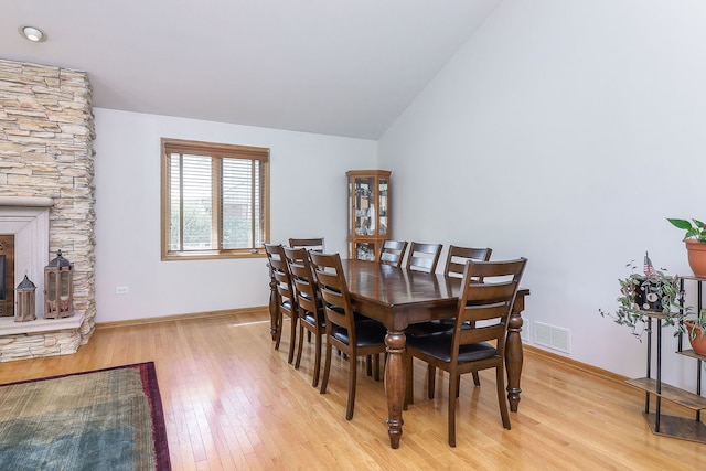 8124 Glenbrook Pl, Tinley Park, IL 60487 - dining space with light wood finished floors and lofted ceiling