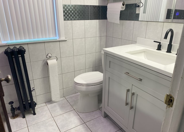 108 W 81st St, Chicago, IL 60620 - bathroom featuring tile walls, vanity, tile patterned flooring, and tasteful backsplash