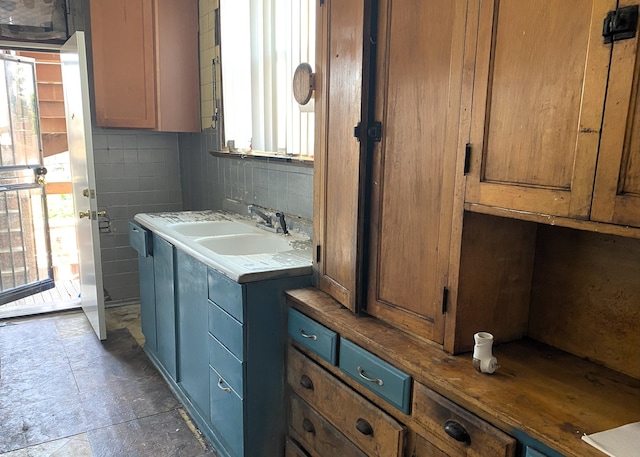 108 W 81st St, Chicago, IL 60620 - bathroom with a sink and decorative backsplash