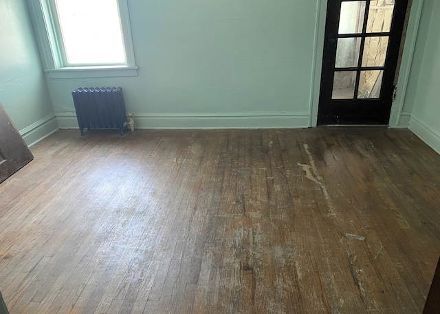 108 W 81st St, Chicago, IL 60620 - unfurnished room with radiator and wood-type flooring