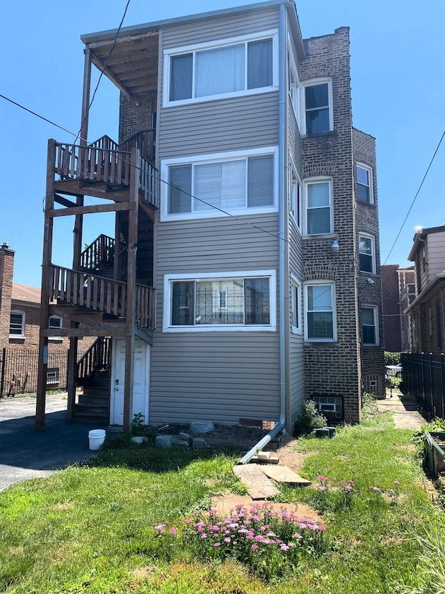108 W 81st St, Chicago, IL 60620 - rear view of house with stairs