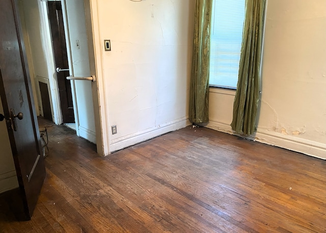 108 W 81st St, Chicago, IL 60620 - unfurnished room with dark wood-style flooring