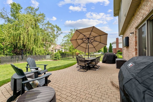 1215 Pendleton Dr, Lemont, IL 60439 - fenced backyard with grilling area, a patio, and outdoor dining area