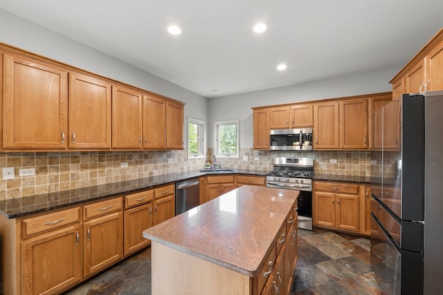 1215 Pendleton Dr, Lemont, IL 60439 - kitchen with stainless steel appliances, brown cabinets, a kitchen island, and recessed lighting