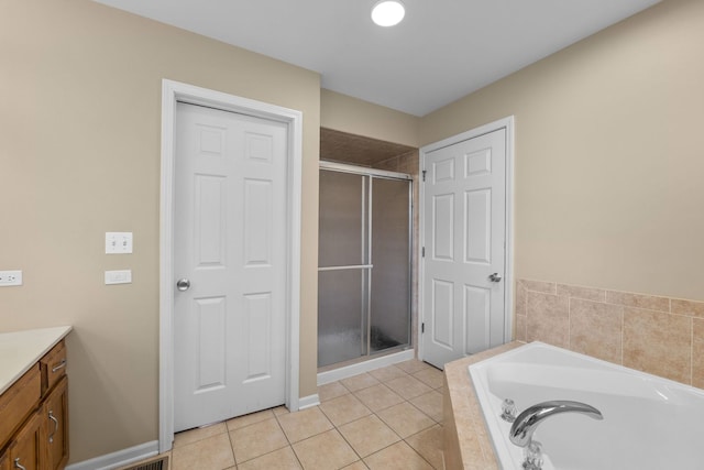 1215 Pendleton Dr, Lemont, IL 60439 - bathroom with a stall shower, vanity, a bath, and tile patterned flooring