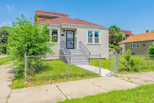 58 W 118th St, Chicago, IL 60628 - view of front facade featuring a fenced front yard