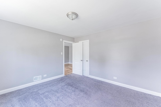 58 W 118th St, Chicago, IL 60628 - carpeted spare room with baseboards