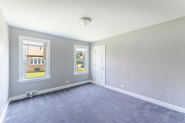 58 W 118th St, Chicago, IL 60628 - carpeted empty room featuring baseboards