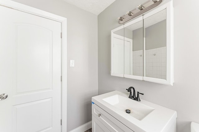 58 W 118th St, Chicago, IL 60628 - full bathroom with vanity and a textured ceiling