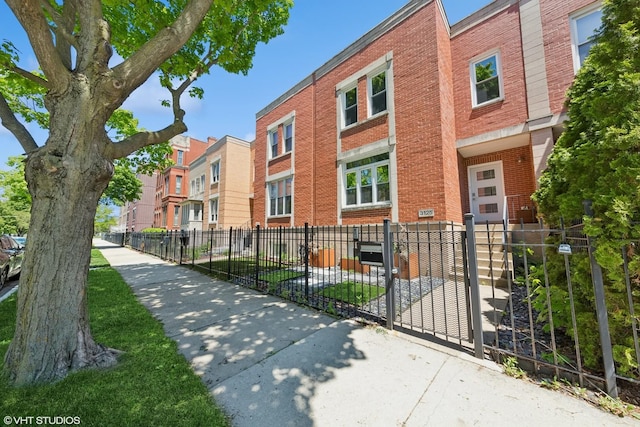 3125 S Giles Ave, Chicago, IL 60616 - view of property with a fenced front yard and a residential view