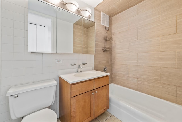 655 W Irving Park Rd Unit 4808, Chicago, IL 60613 - bathroom featuring vanity, tile walls, shower / washtub combination, backsplash, and tile patterned flooring