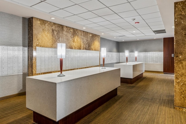 655 W Irving Park Rd Unit 4808, Chicago, IL 60613 - view of community with mail area, wallpapered walls, a paneled ceiling, wainscoting, and tile walls