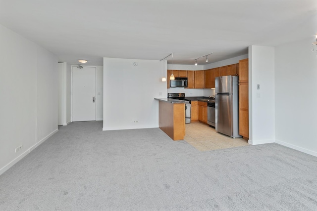 655 W Irving Park Rd Unit 4808, Chicago, IL 60613 - kitchen with appliances with stainless steel finishes, light carpet, dark countertops, open floor plan, and brown cabinets