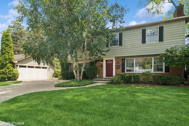 401 S Carlyle Pl, Arlington Heights, IL 60004 - view of front of home featuring a garage, a front lawn, brick siding, driveway, and a chimney