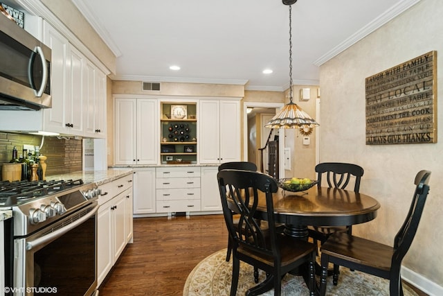 401 S Carlyle Pl, Arlington Heights, IL 60004 - dining room featuring crown molding, dark wood finished floors, and recessed lighting