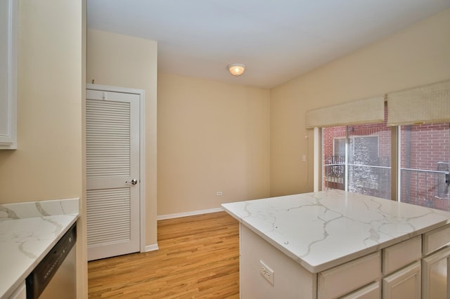 353 E Eastgate Pl, Chicago, IL 60616 - kitchen featuring light wood finished floors and light stone countertops