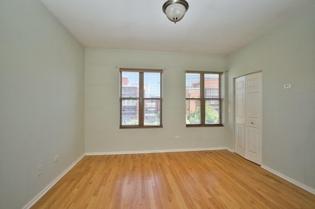 353 E Eastgate Pl, Chicago, IL 60616 - unfurnished room featuring light wood-style floors and baseboards