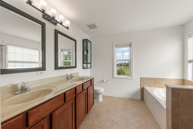1644 Prairieview Blvd, Bolingbrook, IL 60490 - bathroom featuring double vanity, a garden tub, and tile patterned flooring