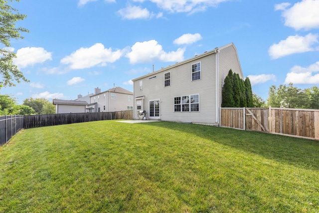 1644 Prairieview Blvd, Bolingbrook, IL 60490 - back of property featuring a patio area and a fenced backyard