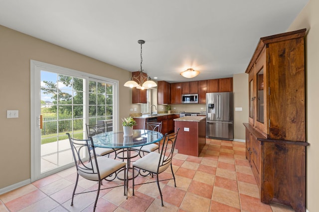 1644 Prairieview Blvd, Bolingbrook, IL 60490 - dining room with a chandelier and light tile patterned floors