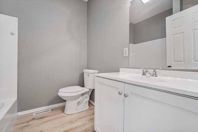 710 W Walnut St, Bloomington, IL 61701 - bathroom with vanity, a tub, wood finished floors, and a shower