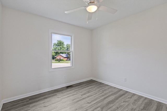 113 New Brunswick Ln, Poplar Grove, IL 61065 - unfurnished room featuring light wood-style floors and a ceiling fan