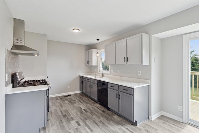 113 New Brunswick Ln, Poplar Grove, IL 61065 - kitchen with black dishwasher, wall chimney exhaust hood, gray cabinets, stainless steel range with gas cooktop, and light wood-style flooring