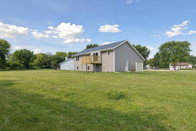 113 New Brunswick Ln, Poplar Grove, IL 61065 - back of property with a lawn and a wooden deck
