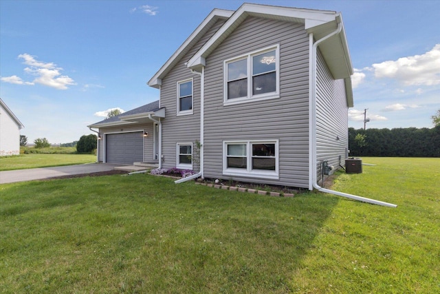 113 New Brunswick Ln, Poplar Grove, IL 61065 - traditional home featuring asphalt driveway, a garage, and a front lawn