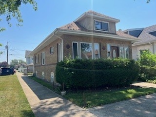 401 23rd Ave, Bellwood, IL 60104 - view of front of house featuring a front lawn