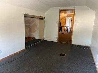 401 23rd Ave, Bellwood, IL 60104 - bonus room featuring lofted ceiling and carpet