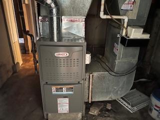 401 23rd Ave, Bellwood, IL 60104 - utility room with heating unit