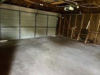 401 23rd Ave, Bellwood, IL 60104 - garage with a garage door opener