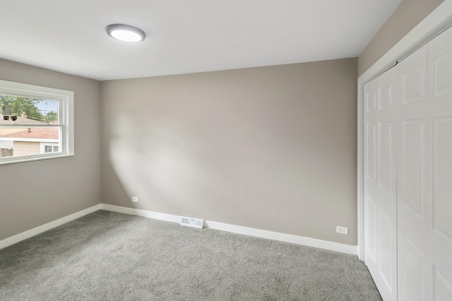15224 Oak St, Dolton, IL 60419 - unfurnished bedroom with carpet floors and baseboards
