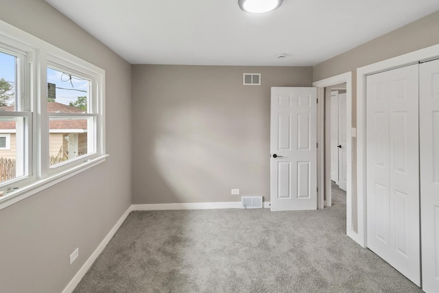 15224 Oak St, Dolton, IL 60419 - unfurnished bedroom featuring carpet flooring and a closet