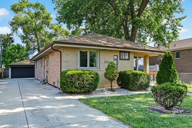 7010 W 72nd St, Chicago, IL 60638 - view of front of house featuring a garage, brick siding, an outdoor structure, and a front lawn