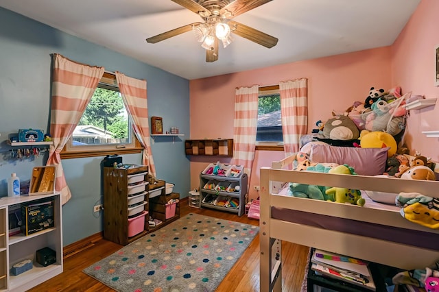 7010 W 72nd St, Chicago, IL 60638 - bedroom with wood finished floors and a ceiling fan