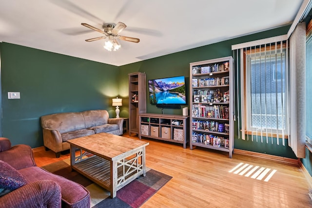 7010 W 72nd St, Chicago, IL 60638 - living area featuring a ceiling fan and wood finished floors